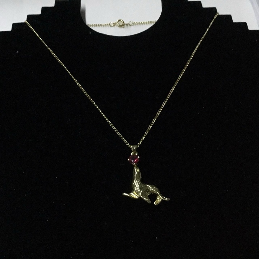Charming Gold Seal Pendant Necklace with Red Accent